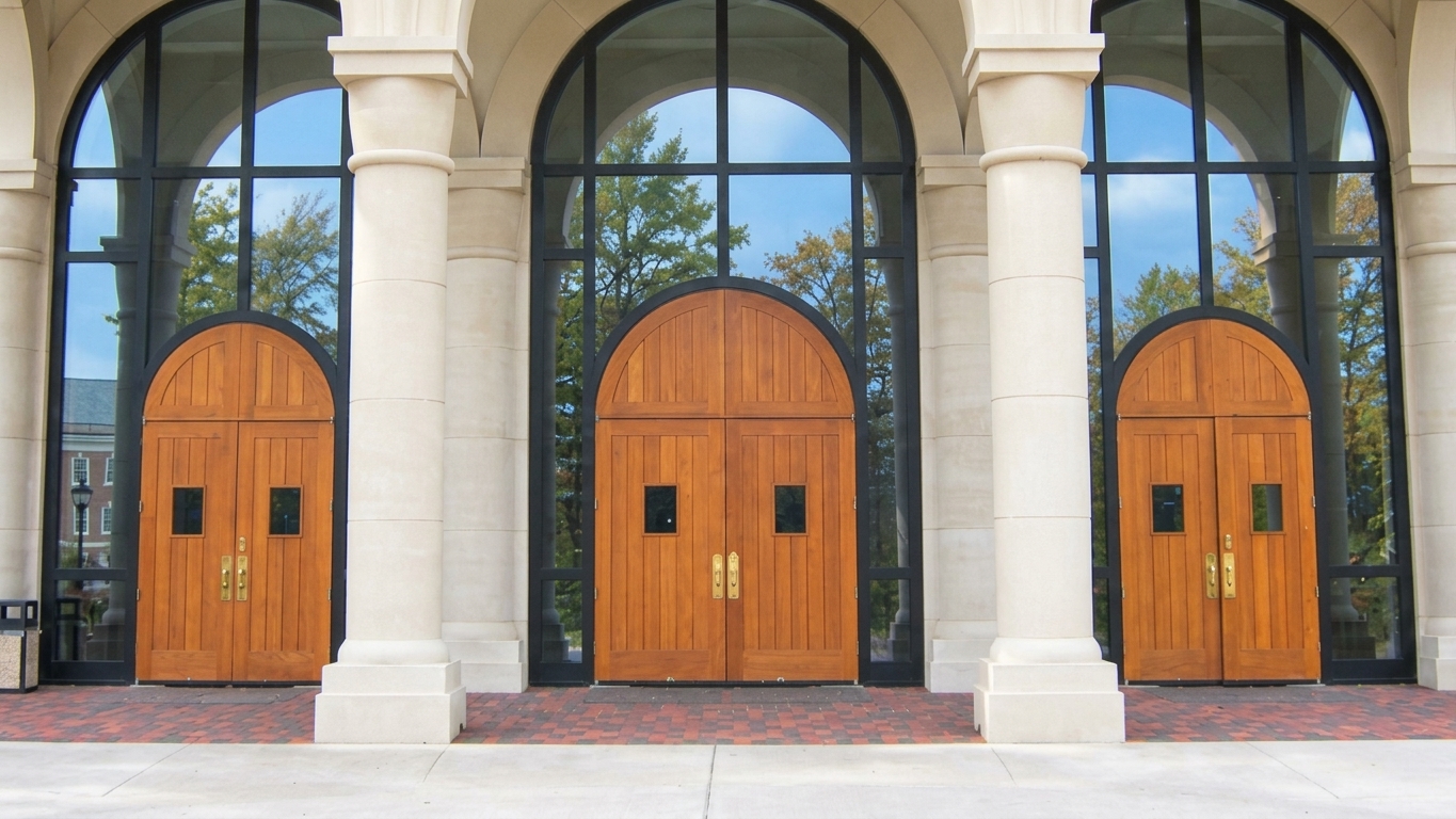 Assumption Church triple-arched oak entry doors
